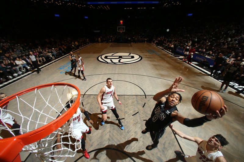 BROOKLYN, NY - JANUARY 15: Trendon Watford #9 of the Brooklyn Nets drives to the basket during the game against the Miami Heat on January 15, 2024 at Barclays Center in Brooklyn, New York. NOTE TO USER: User expressly acknowledges and agrees that, by downloading and or using this Photograph, user is consenting to the terms and conditions of the Getty Images License Agreement. Mandatory Copyright Notice: Copyright 2024 NBAE (Photo by Nathaniel S. Butler/NBAE via Getty Images)