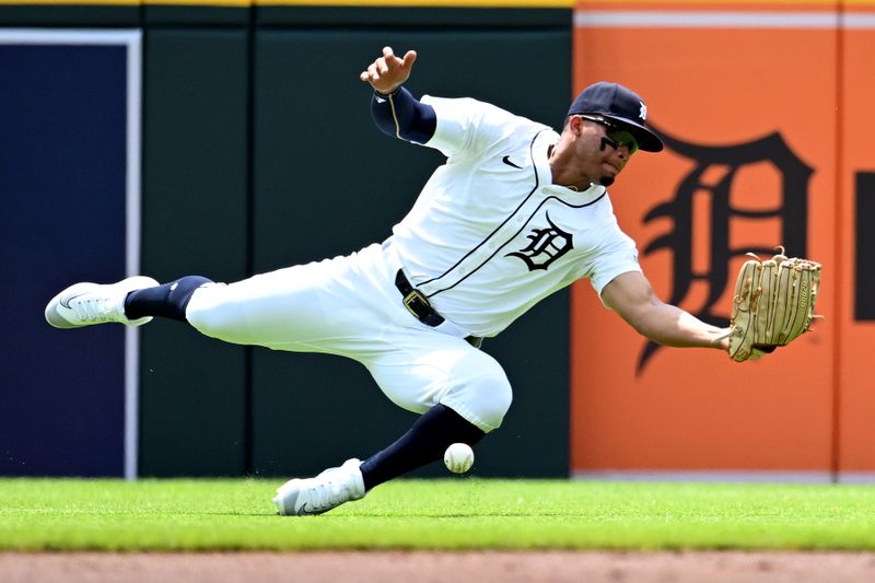 Jul 14, 2024; Detroit, Michigan, USA;  Detroit Tigers right fielder Wenceel Pérez (46) drops a fly ball off the bat of Los Angeles Dodgers catcher Will Smith (16) in the first inning at Comerica Park. Mandatory Credit: Lon Horwedel-USA TODAY Sports