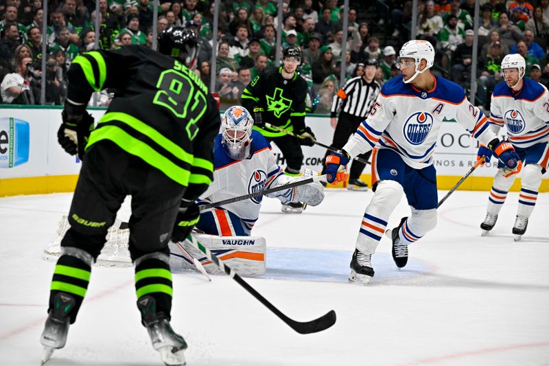 Apr 3, 2024; Dallas, Texas, USA; Dallas Stars center Tyler Seguin (91) scores a goal against Edmonton Oilers goaltender Calvin Pickard (30) during the second period at the American Airlines Center. Mandatory Credit: Jerome Miron-USA TODAY Sports