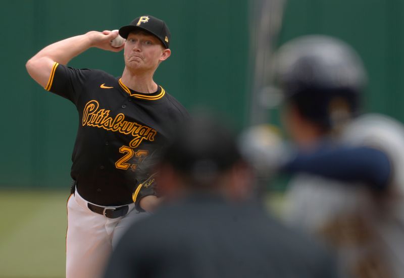 Apr 25, 2024; Pittsburgh, Pennsylvania, USA;  Pittsburgh Pirates starting pitcher Mitch Keller (23) pitches against Milwaukee Brewers right fielder Sal Frelick (10) during the first inning at PNC Park. Mandatory Credit: Charles LeClaire-USA TODAY Sports