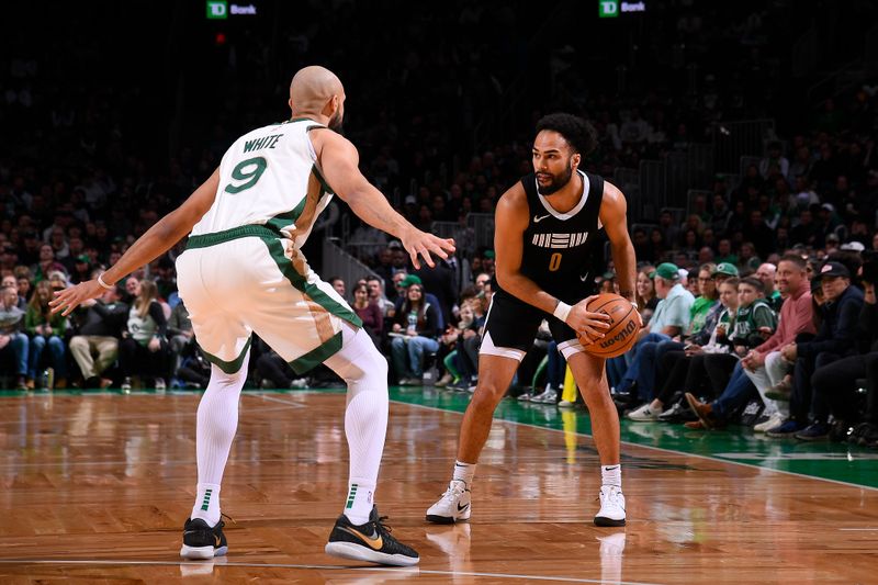 BOSTON, MA - FEBRUARY 4:  Jacob Gilyard #0 of the Memphis Grizzlies handles the ball during the game  against the Boston Celtics on February 4, 2024 at the TD Garden in Boston, Massachusetts. NOTE TO USER: User expressly acknowledges and agrees that, by downloading and or using this photograph, User is consenting to the terms and conditions of the Getty Images License Agreement. Mandatory Copyright Notice: Copyright 2024 NBAE  (Photo by Brian Babineau/NBAE via Getty Images)