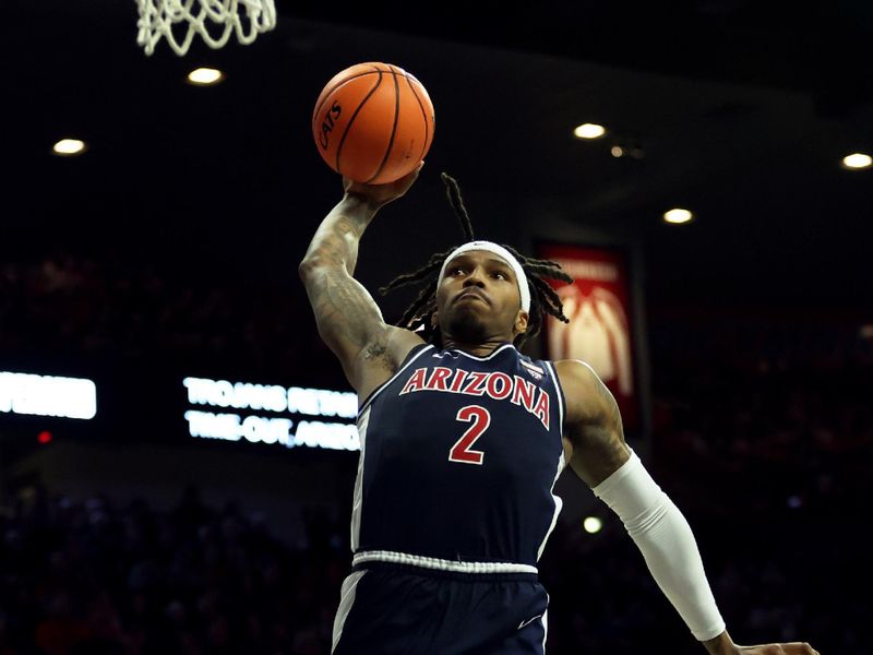 Jan 17, 2024; Tucson, Arizona, USA; Arizona Wildcats guard Caleb Love (2) shoots a basket against the USC Trojans during the second half at McKale Center. Mandatory Credit: Zachary BonDurant-USA TODAY Sports