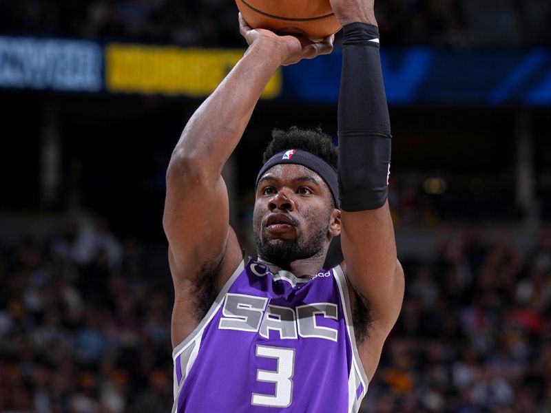 DENVER, CO - APRIL 9: Terence Davis II #3 of the Sacramento Kings shoots a free throw during the game against the Denver Nuggets on April 9, 2023 at the Ball Arena in Denver, Colorado. NOTE TO USER: User expressly acknowledges and agrees that, by downloading and/or using this Photograph, user is consenting to the terms and conditions of the Getty Images License Agreement. Mandatory Copyright Notice: Copyright 2023 NBAE (Photo by Garrett Ellwood/NBAE via Getty Images)