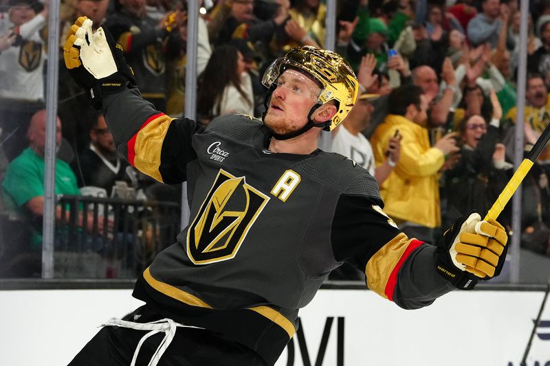 Mar 17, 2024; Las Vegas, Nevada, USA; Vegas Golden Knights center Jack Eichel (9) celebrates after scoring a goal against the New Jersey Devils during the third period at T-Mobile Arena. Mandatory Credit: Stephen R. Sylvanie-USA TODAY Sports