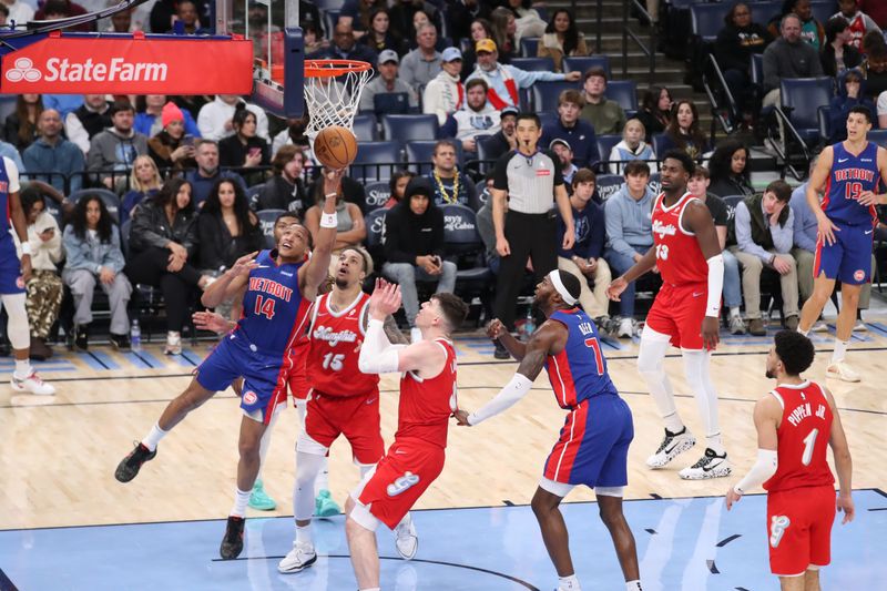 MEMPHIS, TN - NOVEMBER 27: Wendell Moore Jr. #14 of the Detroit Pistons drives to the basket during the game against the Memphis Grizzlies on November 27, 2024 at FedExForum in Memphis, Tennessee. NOTE TO USER: User expressly acknowledges and agrees that, by downloading and or using this photograph, User is consenting to the terms and conditions of the Getty Images License Agreement. Mandatory Copyright Notice: Copyright 2024 NBAE (Photo by Joe Murphy/NBAE via Getty Images)