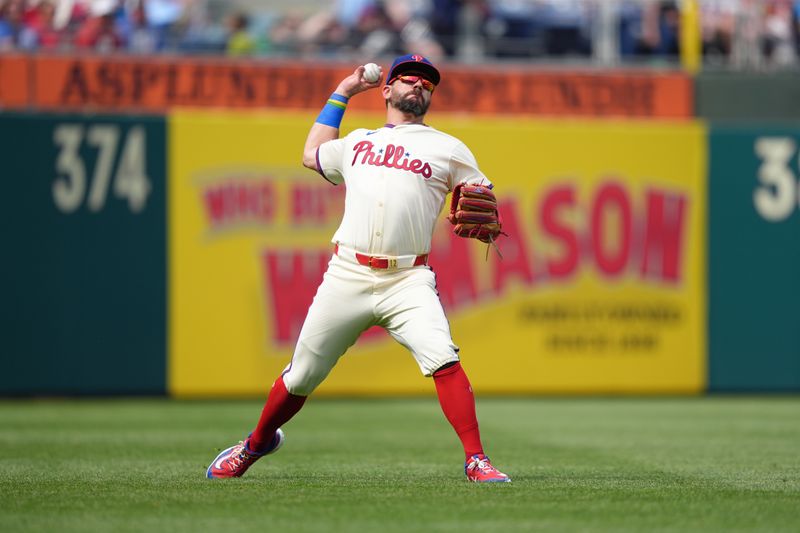 Apr 19, 2025; Philadelphia, Pennsylvania, USA; Philadelphia Phillies designated hitter Kyle Schwarber (12) throws to home against the Miami Marlins in the sixth inning at Citizens Bank Park. Mandatory Credit: Kyle Ross-Imagn Images