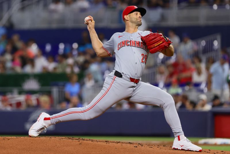 Aug 5, 2024; Miami, Florida, USA; Cincinnati Reds starting pitcher Nick Martinez (28) delivers a pitch against the Miami Marlins during the first inning at loanDepot Park. Mandatory Credit: Sam Navarro-USA TODAY Sports