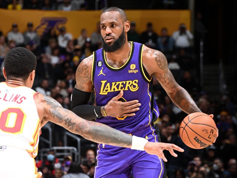 LOS ANGELES, CA - JANUARY 6: LeBron James #6 of the Los Angeles Lakers handles the ball during the game against the Atlanta Hawks on January 6, 2023 at Crypto.Com Arena in Los Angeles, California. NOTE TO USER: User expressly acknowledges and agrees that, by downloading and/or using this Photograph, user is consenting to the terms and conditions of the Getty Images License Agreement. Mandatory Copyright Notice: Copyright 2023 NBAE (Photo by Andrew D. Bernstein/NBAE via Getty Images)