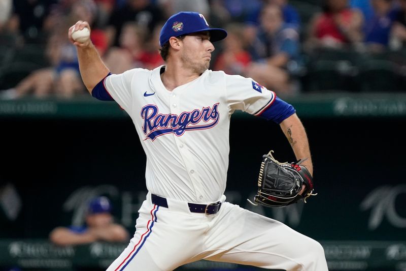 Apr 25, 2024; Arlington, Texas, USA; Texas Rangers pitcher Cole Winn (60) throws to the plate during the seventh inning Seattle Mariners at Globe Life Field. Mandatory Credit: Raymond Carlin III-USA TODAY Sports