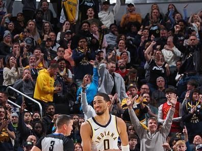 INDIANAPOLIS, IN - NOVEMBER 22: Tyrese Haliburton #0 of the Indiana Pacers celebrates during the game against the Toronto Raptors on November 22, 2023 at Gainbridge Fieldhouse in Indianapolis, Indiana. NOTE TO USER: User expressly acknowledges and agrees that, by downloading and or using this Photograph, user is consenting to the terms and conditions of the Getty Images License Agreement. Mandatory Copyright Notice: Copyright 2023 NBAE (Photo by Ron Hoskins/NBAE via Getty Images)