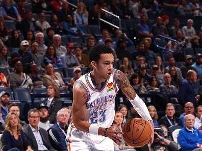 OKLAHOMA CITY, OK - DECEMBER 18: Tre Mann #23 of the Oklahoma City Thunder handles the ball during the game against the Memphis Grizzlies  on December 18, 2023 at Paycom Arena in Oklahoma City, Oklahoma. NOTE TO USER: User expressly acknowledges and agrees that, by downloading and or using this photograph, User is consenting to the terms and conditions of the Getty Images License Agreement. Mandatory Copyright Notice: Copyright 2023 NBAE (Photo by Zach Beeker/NBAE via Getty Images)