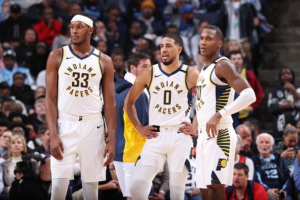 MEMPHIS, TN - DECEMBER 21: Myles Turner #33 of the Indiana Pacers, Tyrese Haliburton #0 of the Indiana Pacers and Bennedict Mathurin #00 of the Indiana Pacers look on during the game against the Memphis Grizzlies on December 21, 2023 at FedExForum in Memphis, Tennessee. NOTE TO USER: User expressly acknowledges and agrees that, by downloading and or using this photograph, User is consenting to the terms and conditions of the Getty Images License Agreement. Mandatory Copyright Notice: Copyright 2023 NBAE (Photo by Joe Murphy/NBAE via Getty Images)