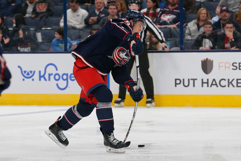 Feb 10, 2024; Columbus, Ohio, USA; Columbus Blue Jackets right wing Yegor Chinakhov (59) wrists a shot on goal against the Tampa Bay Lightning during the second period at Nationwide Arena. Mandatory Credit: Russell LaBounty-USA TODAY Sports