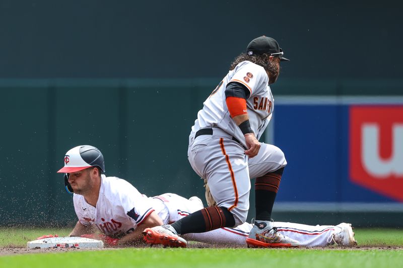 May 24, 2023; Minneapolis, Minnesota, USA; Minnesota Twins right fielder Matt Wallner (38) slides into second base for a double as San Francisco Giants shortstop Brandon Crawford (35) attempts a tag in the second inning at Target Field. Mandatory Credit: Matt Krohn-USA TODAY Sports