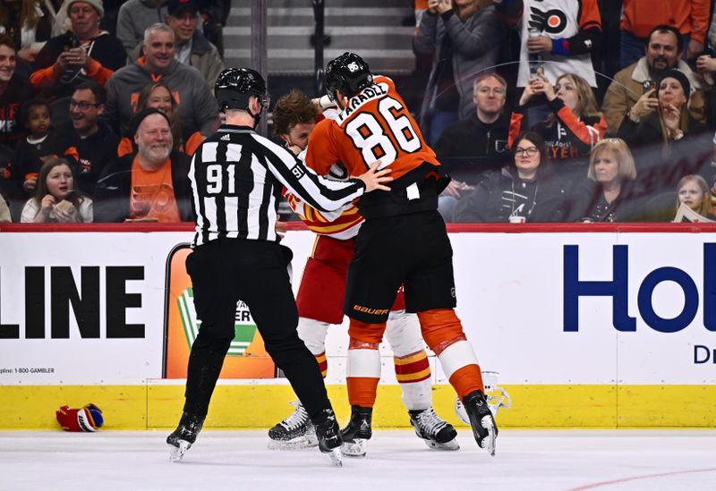 Jan 6, 2024; Philadelphia, Pennsylvania, USA; Philadelphia Flyers left wing Joel Farabee (86) and Calgary Flames center Elias Lindholm (28) fight in the second period at Wells Fargo Center. Mandatory Credit: Kyle Ross-USA TODAY Sports