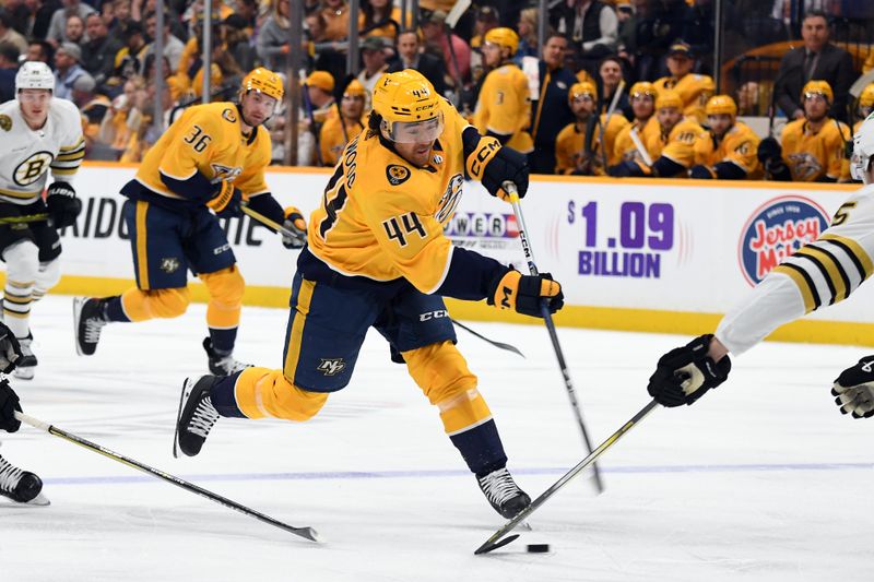 Apr 2, 2024; Nashville, Tennessee, USA; Nashville Predators left wing Kiefer Sherwood (44) shoots the puck during the first period against the Boston Bruins at Bridgestone Arena. Mandatory Credit: Christopher Hanewinckel-USA TODAY Sports