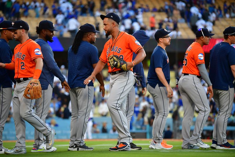 Jun 25, 2023; Los Angeles, California, USA; Houston Astros and first baseman Jose Abreu (79) celebrate the victory against the Los Angeles Dodgers at Dodger Stadium. Mandatory Credit: Gary A. Vasquez-USA TODAY Sports