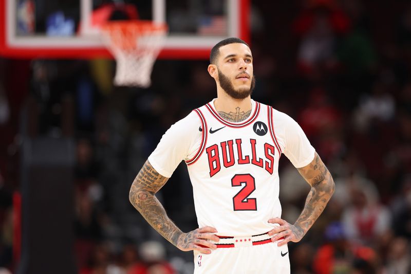 CHICAGO, ILLINOIS - OCTOBER 16: Lonzo Ball #2 of the Chicago Bulls looks on against the Minnesota Timberwolves during the first half of a preseason game at the United Center on October 16, 2024 in Chicago, Illinois. NOTE TO USER: User expressly acknowledges and agrees that, by downloading and or using this photograph, User is consenting to the terms and conditions of the Getty Images License Agreement.  (Photo by Michael Reaves/Getty Images)