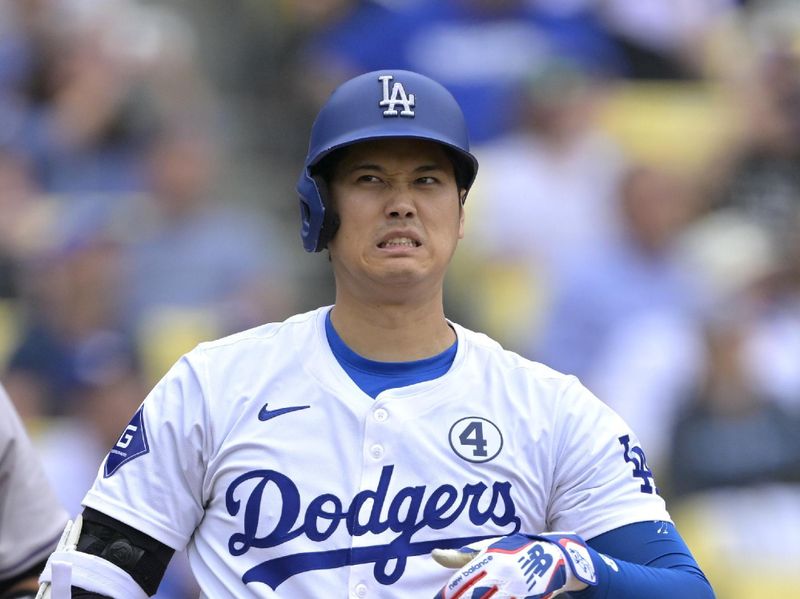 Jun 2, 2024; Los Angeles, California, USA;  Los Angeles Dodgers designated hitter Shohei Ohtani (17) reacts after fouling off a pitch in the fifth inning against the Colorado Rockies at Dodger Stadium. Mandatory Credit: Jayne Kamin-Oncea-USA TODAY Sports