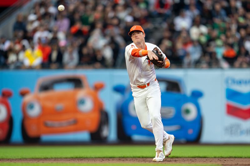 Jul 30, 2024; San Francisco, California, USA;  San Francisco Giants short stop Tyler Fitzgerald (49) throws out Oakland Athletics shortstop Max Schuemann (not pictured) during the third inning at Oracle Park. Mandatory Credit: Neville E. Guard-USA TODAY Sports