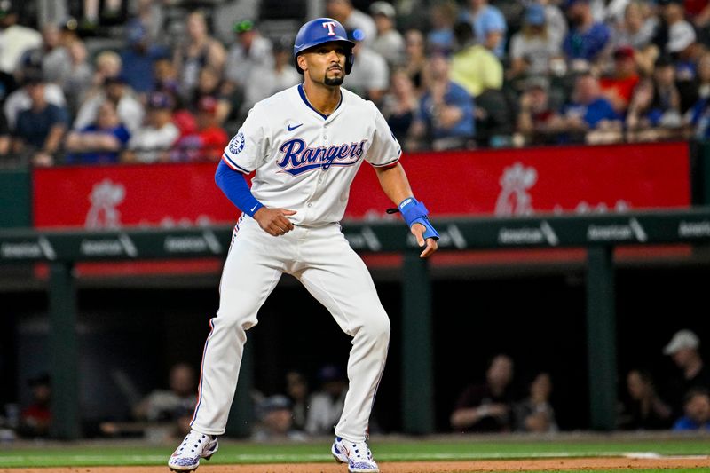 Jun 8, 2024; Arlington, Texas, USA; Texas Rangers second baseman Marcus Semien (2) checks the play during the first inning against the San Francisco Giants at Globe Life Field. Mandatory Credit: Jerome Miron-USA TODAY Sports