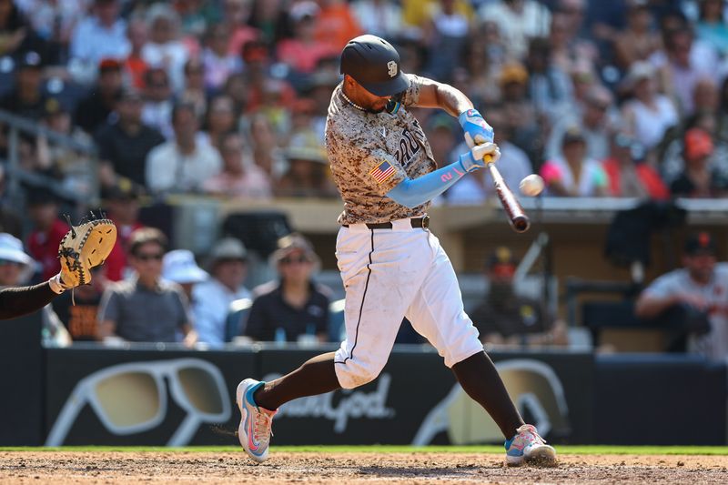 Sep 8, 2024; San Diego, California, USA; San Diego Padres second baseman Xander Bogaerts (2) hits a two run home run during the eighth inning against the San Francisco Giants at Petco Park. Mandatory Credit: Chadd Cady-Imagn Images