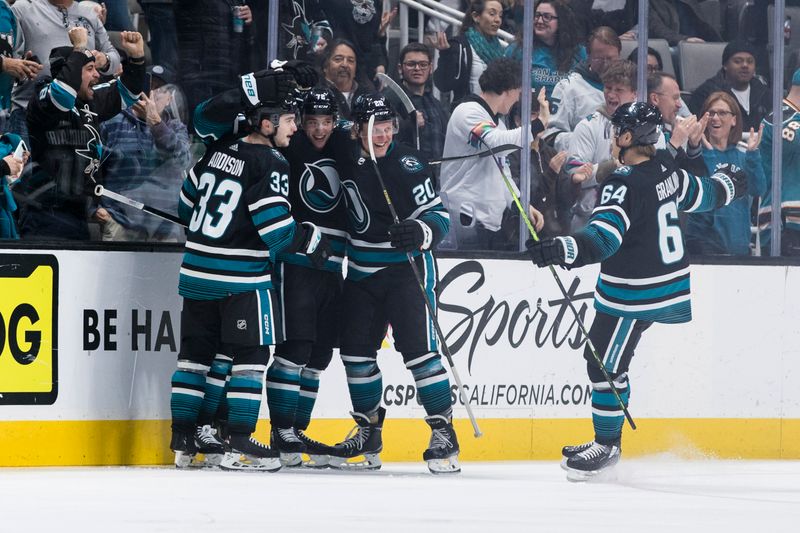 Mar 5, 2024; San Jose, California, USA; San Jose Sharks left wing Anthony Duclair (10) celebrates with teammates after he scored against the Dallas Stars during the first period at SAP Center at San Jose. Mandatory Credit: John Hefti-USA TODAY Sports