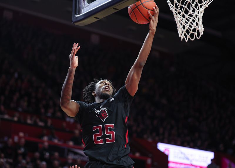 Feb 25, 2024; Piscataway, New Jersey, USA; Rutgers Scarlet Knights guard Jeremiah Williams (25) scores a basket during the second half against the Maryland Terrapins at Jersey Mike's Arena. Mandatory Credit: Vincent Carchietta-USA TODAY Sports