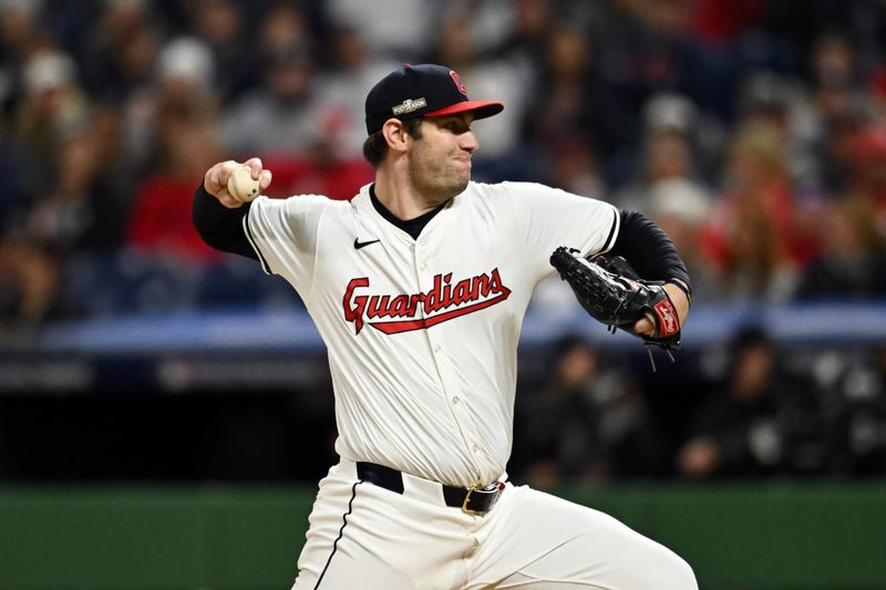 Oct 18, 2024; Cleveland, Ohio, USA; Cleveland Guardians pitcher Gavin Williams (32) pitches against the New York Yankees in the first inning during game four of the ALCS for the 2024 MLB playoffs at Progressive Field. Mandatory Credit: Ken Blaze-Imagn Images