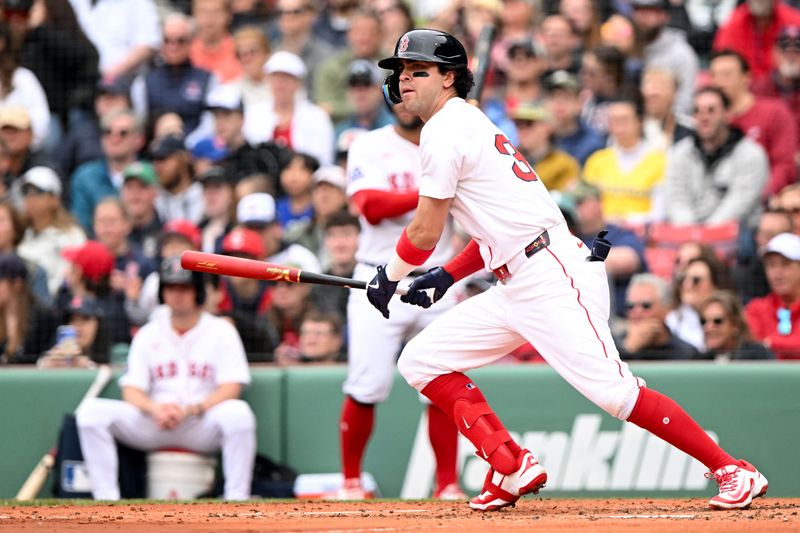 May 25, 2025; Boston, Massachusetts, USA; Boston Red Sox shortstop Marcelo Mayer (39) hits a single against the Baltimore Orioles for his first MLB hit during the second inning at Fenway Park. Mandatory Credit: Brian Fluharty-Imagn Images