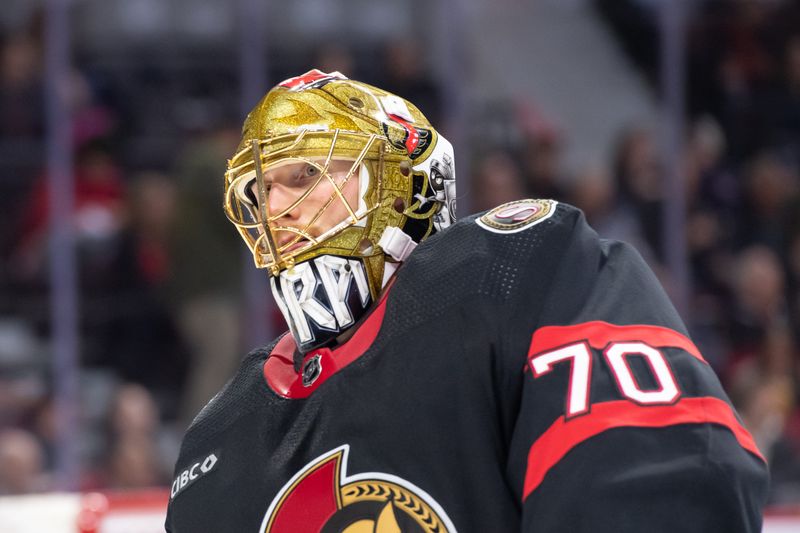 Mar 12, 2024; Ottawa, Ontario, CAN; Ottawa Senators goalie Joonas Korpisalo (70) skates during a break in action  in the second period against the Pittsburgh Penguins at the Canadian Tire Centre. Mandatory Credit: Marc DesRosiers-USA TODAY Sports