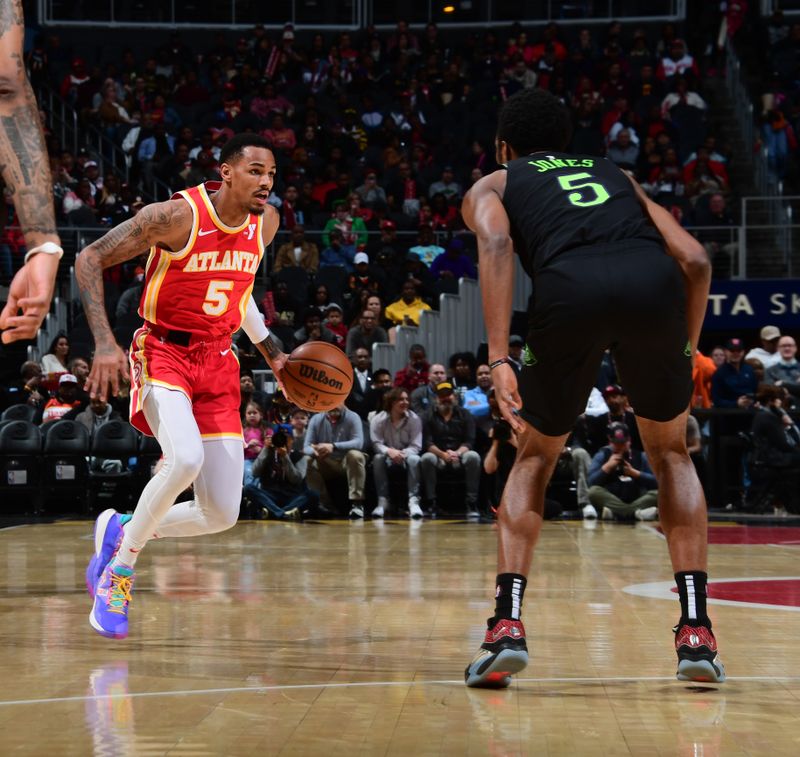 ATLANTA, GA - MARCH 10: Dejounte Murray #5 of the Atlanta Hawks dribbles the ball during the game against the New Orleans Pelicans on March 10, 2024 at State Farm Arena in Atlanta, Georgia.  NOTE TO USER: User expressly acknowledges and agrees that, by downloading and/or using this Photograph, user is consenting to the terms and conditions of the Getty Images License Agreement. Mandatory Copyright Notice: Copyright 2024 NBAE (Photo by Scott Cunningham/NBAE via Getty Images)