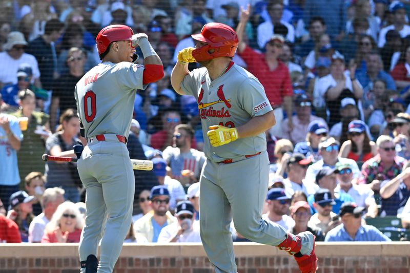 Jun 14, 2024; Chicago, Illinois, USA;  St. Louis Cardinals catcher Pedro Pages (43) celebrates with  shortstop Masyn Winn (0) after he hits a home run during the eighth inning against the Chicago Cubs  at Wrigley Field. Mandatory Credit: Matt Marton-USA TODAY Sports