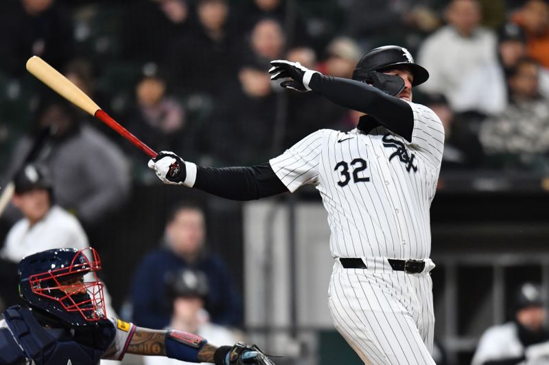 Apr 2, 2024; Chicago, Illinois, USA; Chicago White Sox designated Gavin Sheets (32) hits an RBI single during the sixth inning against the Atlanta Braves at Guaranteed Rate Field. Mandatory Credit: Patrick Gorski-USA TODAY Sports