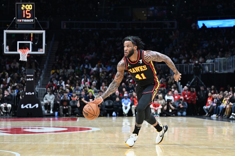 ATLANTA, GA - JANUARY 12: Saddiq Bey #41 of the Atlanta Hawks dribbles the ball during the game against the Indiana Pacers on January 12, 2024 at State Farm Arena in Atlanta, Georgia.  NOTE TO USER: User expressly acknowledges and agrees that, by downloading and/or using this Photograph, user is consenting to the terms and conditions of the Getty Images License Agreement. Mandatory Copyright Notice: Copyright 2024 NBAE (Photo by Adam Hagy/NBAE via Getty Images)