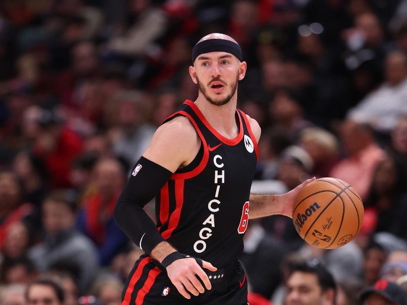 CHICAGO, ILLINOIS - JANUARY 30: Alex Caruso #6 of the Chicago Bulls dribbles up the court against the Toronto Raptors during the first half at the United Center on January 30, 2024 in Chicago, Illinois. NOTE TO USER: User expressly acknowledges and agrees that, by downloading and or using this photograph, User is consenting to the terms and conditions of the Getty Images License Agreement.  (Photo by Michael Reaves/Getty Images)