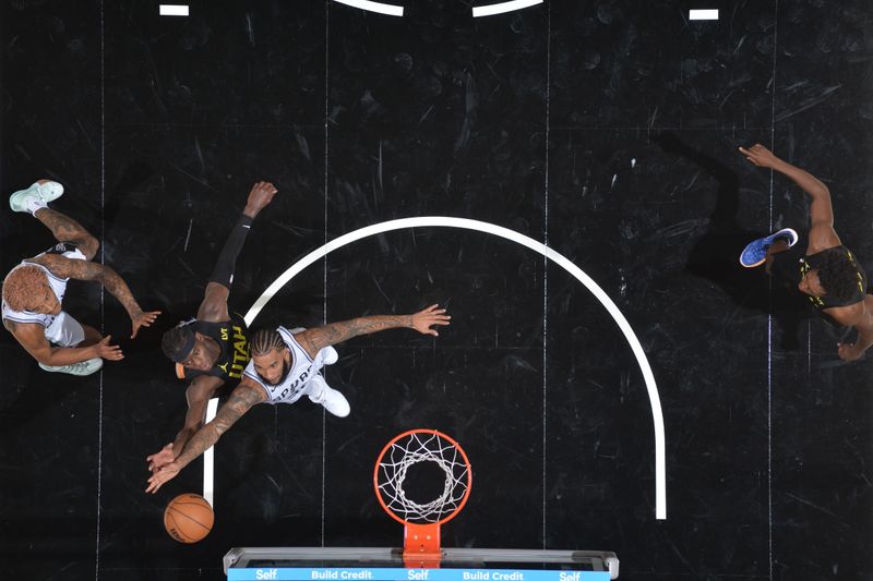 SAN ANTONIO, TX - OCTOBER 12: Julian Champagnie #30 of the San Antonio Spurs goes up for the rebound during the game against the Utah Jazz during a NBA pre season game on October 12, 2024 at the Frost Bank Center in San Antonio, Texas. NOTE TO USER: User expressly acknowledges and agrees that, by downloading and or using this photograph, user is consenting to the terms and conditions of the Getty Images License Agreement. Mandatory Copyright Notice: Copyright 2024 NBAE (Photos by Michael Gonzales/NBAE via Getty Images)