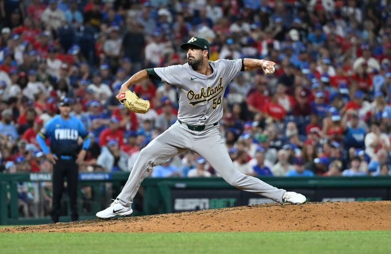 Jul 12, 2024; Philadelphia, Pennsylvania, USA; Oakland Athletics relief pitcher Scott Alexander (54) throws a pitch against the Philadelphia Phillies in the seventh inning at Citizens Bank Park. Mandatory Credit: Kyle Ross-USA TODAY Sports