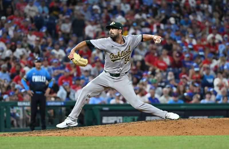 Jul 12, 2024; Philadelphia, Pennsylvania, USA; Oakland Athletics relief pitcher Scott Alexander (54) throws a pitch against the Philadelphia Phillies in the seventh inning at Citizens Bank Park. Mandatory Credit: Kyle Ross-USA TODAY Sports