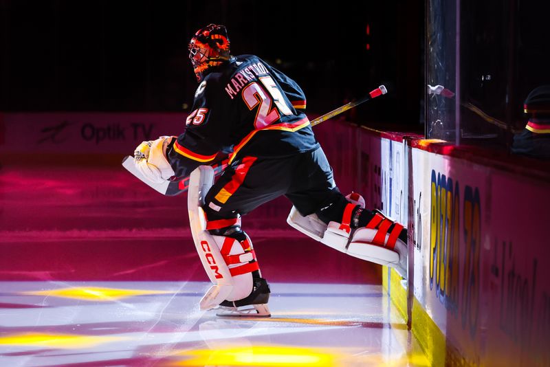 Apr 2, 2024; Calgary, Alberta, CAN; Calgary Flames goaltender Jacob Markstrom (25) takes the ice prior to the game against the Anaheim Ducks at Scotiabank Saddledome. Mandatory Credit: Sergei Belski-USA TODAY Sports