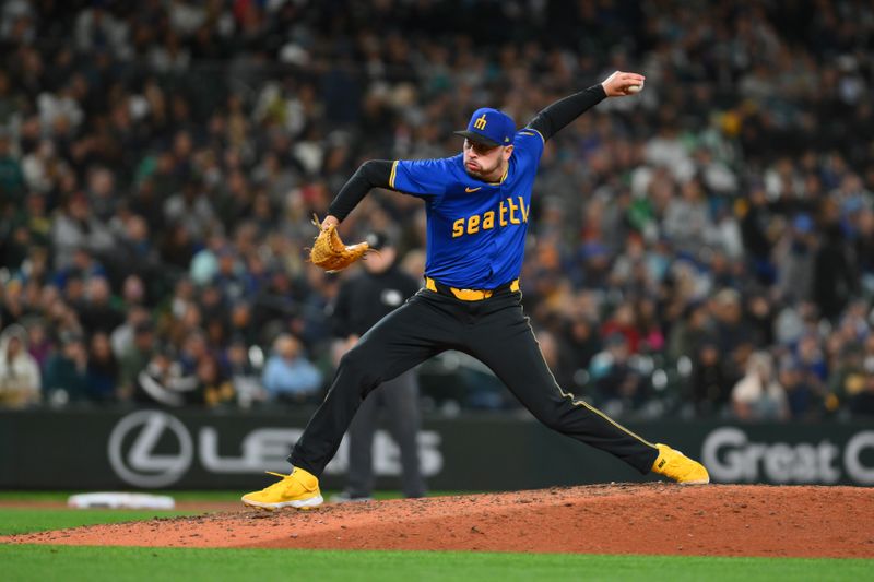 Sep 27, 2024; Seattle, Washington, USA; Seattle Mariners relief pitcher Tayler Saucedo (60) pitches to the Oakland Athletics during the eighth inning at T-Mobile Park. Mandatory Credit: Steven Bisig-Imagn Images