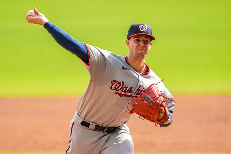 Oct 1, 2023; Cumberland, Georgia, USA; Washington Nationals starting pitcher Jackson Rutledge (79) pitches against the Atlanta Braves during the first inning at Truist Park. Mandatory Credit: Dale Zanine-USA TODAY Sports