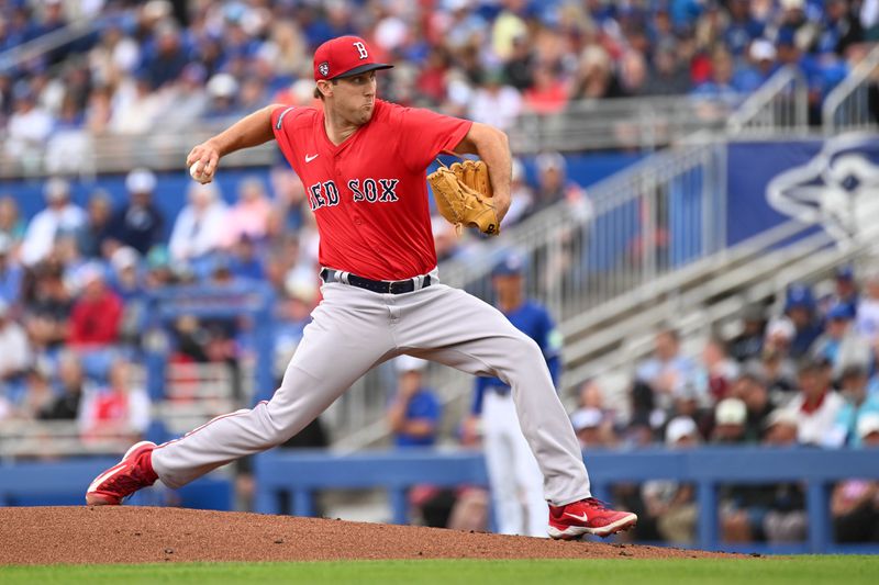 Mar 22, 2024; Dunedin, Florida, USA; Boston Red Sox starting pitcher Justin Hagenman (95) throws a pitch in the first inning of the spring training game against the Toronto Blue Jays  at TD Ballpark. Mandatory Credit: Jonathan Dyer-USA TODAY Sports