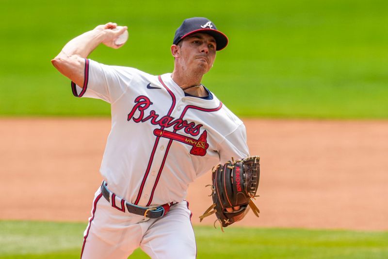 Apr 11, 2024; Cumberland, Georgia, USA; Atlanta Braves starting pitcher Allan Winans (72) pitches against the New York Mets during the first inning at Truist Park. Mandatory Credit: Dale Zanine-USA TODAY Sports