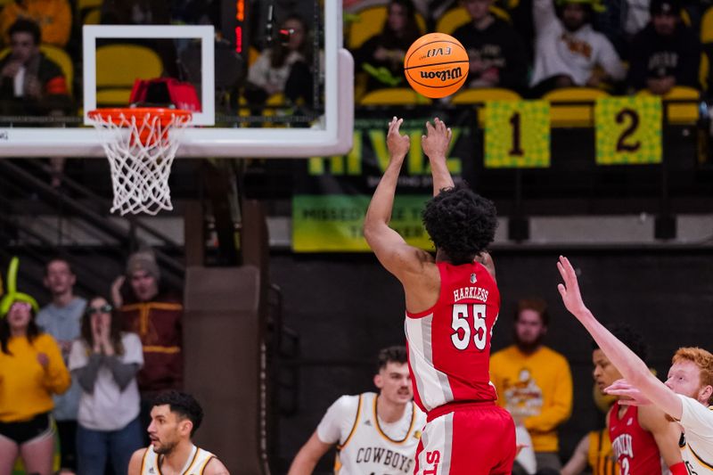 Feb 8, 2023; Laramie, Wyoming, USA; UNLV Runnin' Rebels guard EJ Harkless (55) shoots against the Wyoming Cowboys during the second half at Arena-Auditorium. Mandatory Credit: Troy Babbitt-USA TODAY Sports