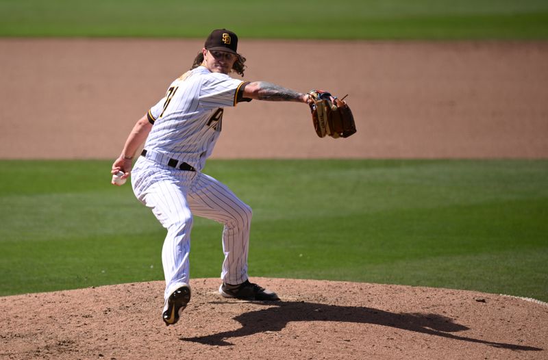 Apr 19, 2023; San Diego, California, USA; San Diego Padres relief pitcher Josh Hader (71) throws a pitch against the Atlanta Braves during the ninth inning at Petco Park. Mandatory Credit: Orlando Ramirez-USA TODAY Sports