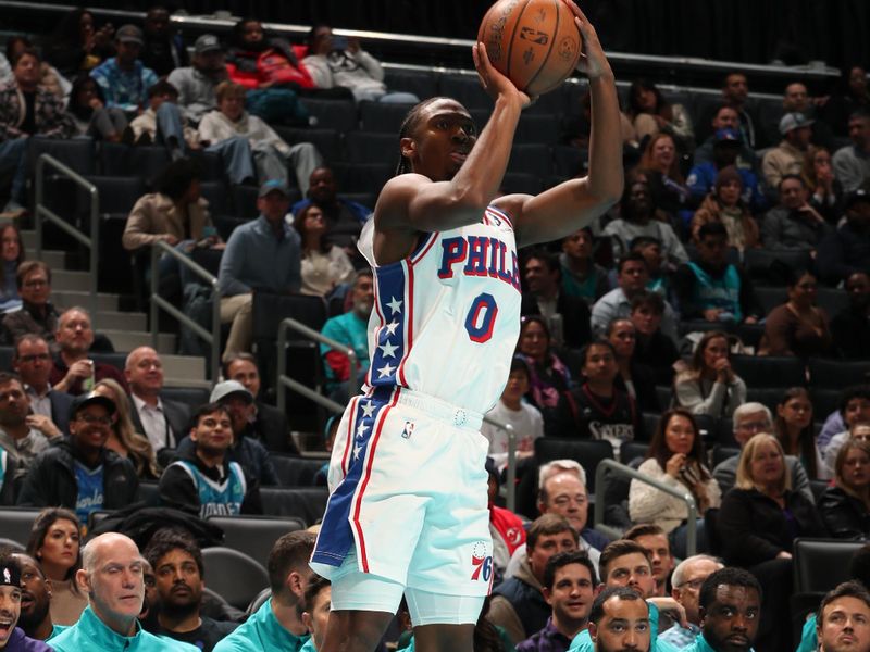 CHARLOTTE, NC - DECEMBER 3: Tyrese Maxey #0 of the Philadelphia 76ers shoots a three point basket during the game against the Charlotte Hornets during an NBA Emirates Cup game on December 3, 2024 at Spectrum Center in Charlotte, North Carolina. NOTE TO USER: User expressly acknowledges and agrees that, by downloading and or using this photograph, User is consenting to the terms and conditions of the Getty Images License Agreement. Mandatory Copyright Notice: Copyright 2024 NBAE (Photo by Kent Smith/NBAE via Getty Images)