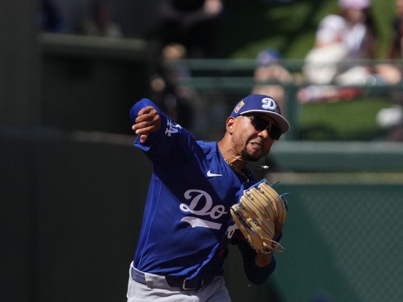 Mar 15, 2026; Mesa, Arizona, USA; Los Angeles Dodgers shortstop Mookie Betts (50) makes the play against the Chicago Cubs in the third inning at Sloan Park. Mandatory Credit: Rick Scuteri-Imagn Images