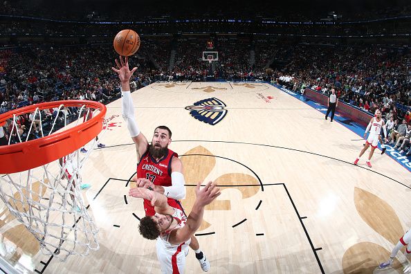 NEW ORLEANS, LA - DECEMBER 23: Jonas Valanciunas #17 of the New Orleans Pelicans shoots the ball during the game against the Houston Rockets on December 23, 2023 at the Smoothie King Center in New Orleans, Louisiana. NOTE TO USER: User expressly acknowledges and agrees that, by downloading and or using this Photograph, user is consenting to the terms and conditions of the Getty Images License Agreement. Mandatory Copyright Notice: Copyright 2023 NBAE (Photo by Layne Murdoch Jr./NBAE via Getty Images)