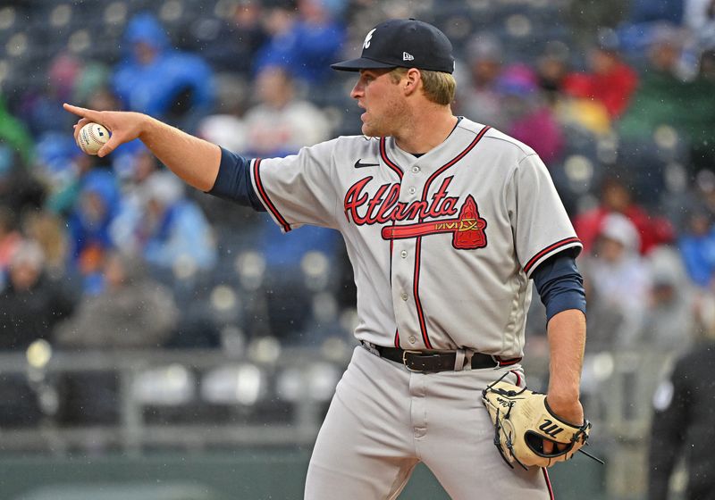 Apr 15, 2023; Kansas City, Missouri, USA;  Atlanta Braves starting pitcher Bryce Elder (55) directs his infielders  during the first inning against the Kansas City Royals at Kauffman Stadium. Mandatory Credit: Peter Aiken-USA TODAY Sports